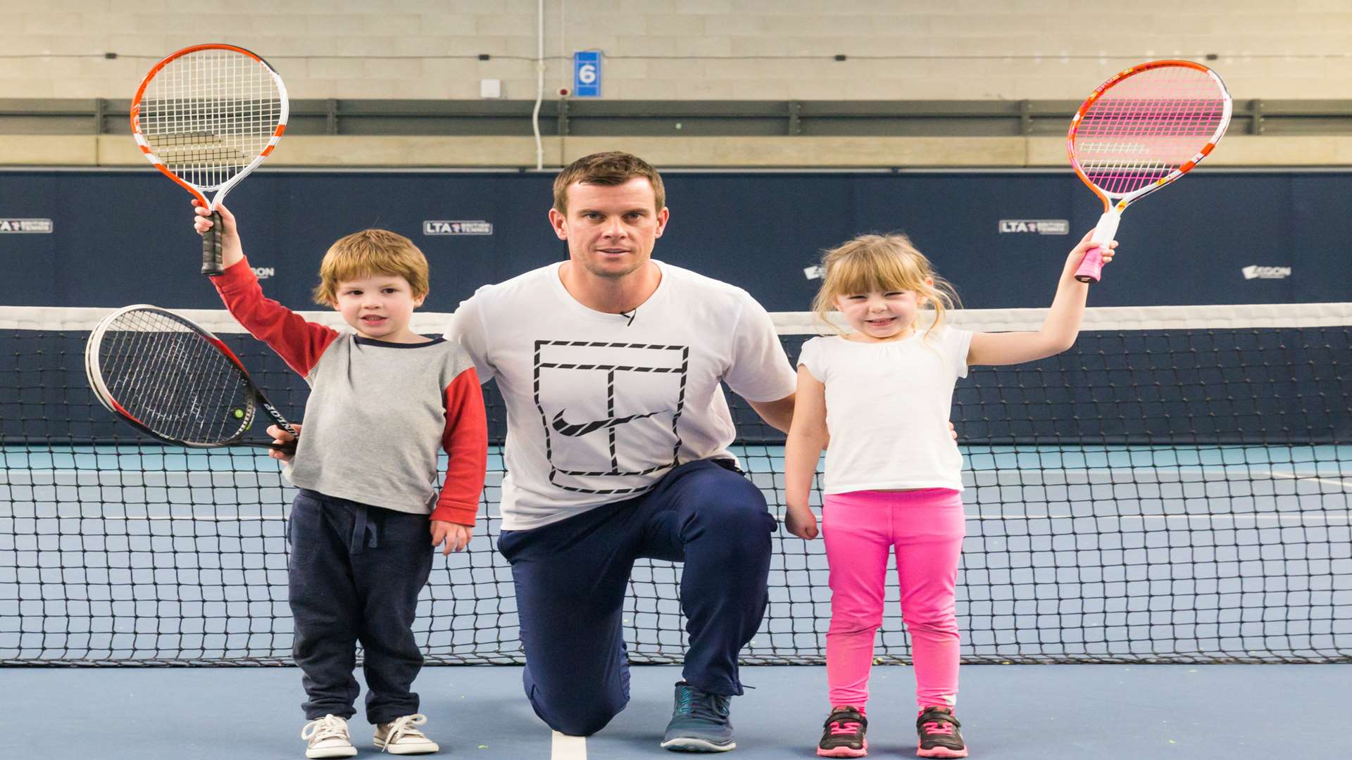 Leon Smith with young tennis players