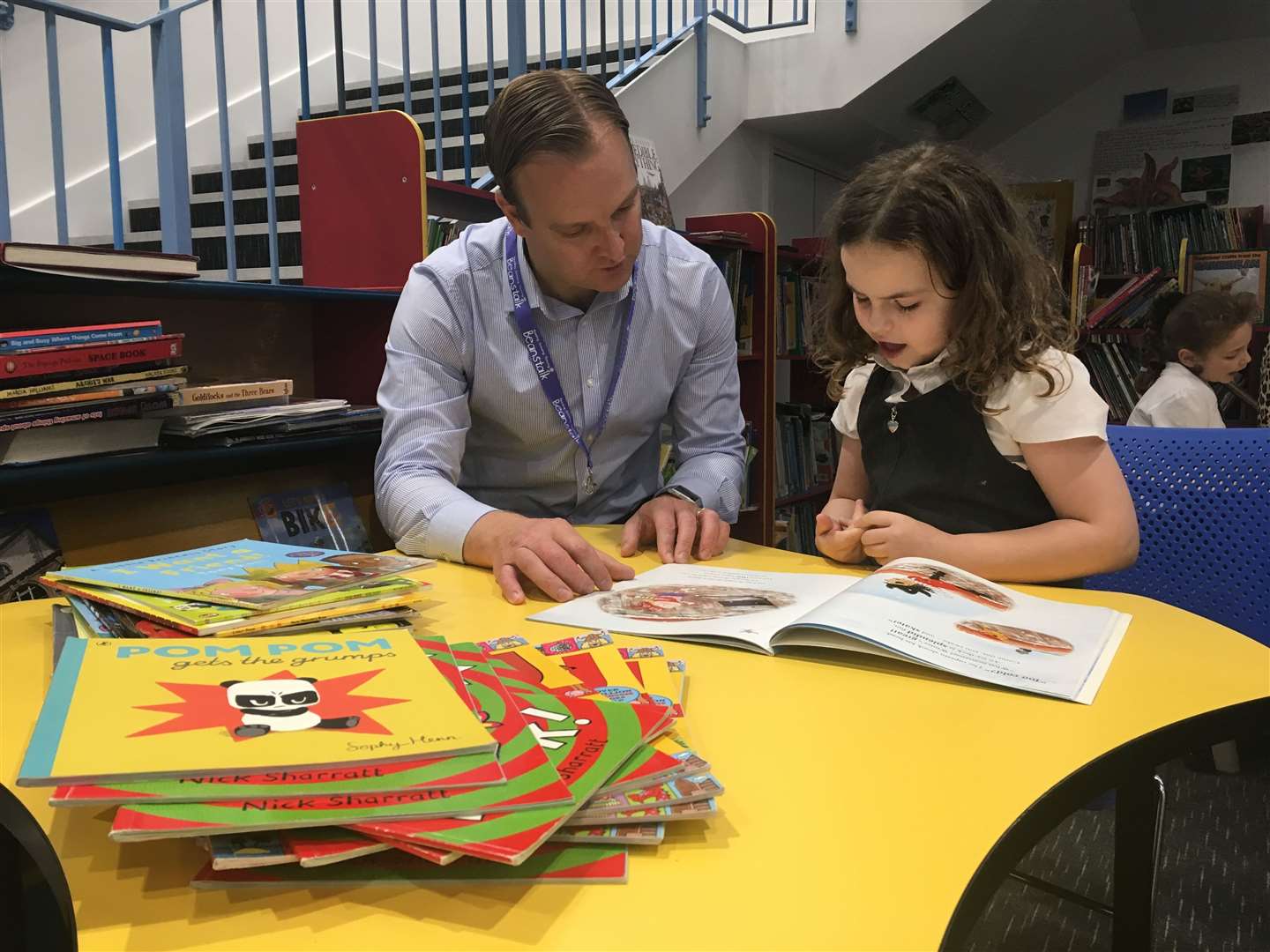 Coram Beanstalk assists children with their reading schools by providing additional support in schools