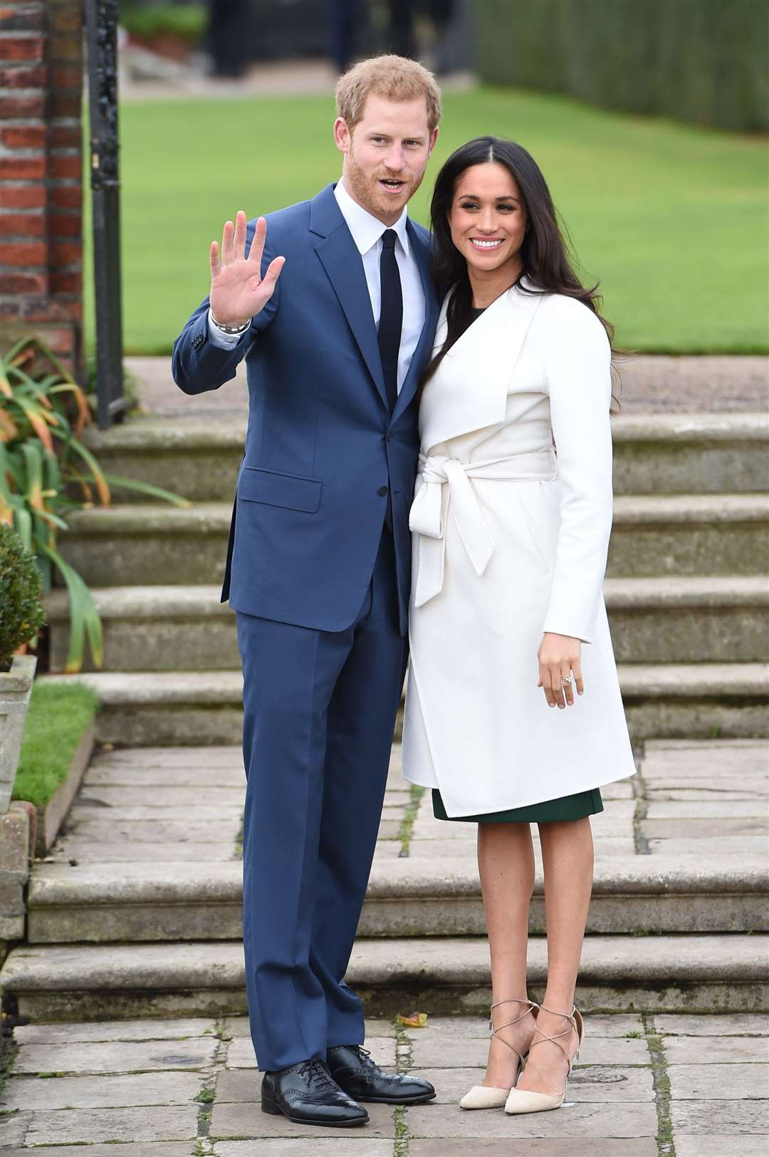 Prince Harry and Meghan Markle announcing their engagement last year