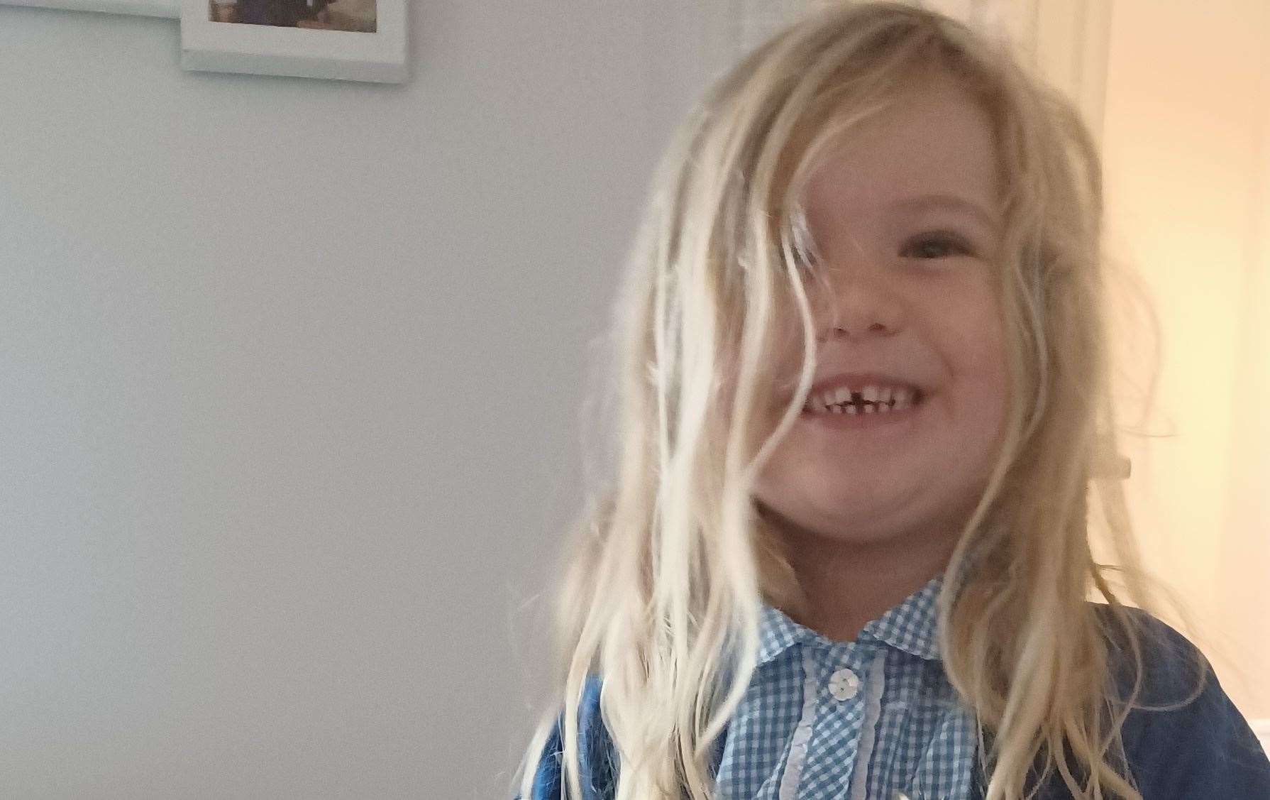 Millie is starting school in September - and already has some hand-me-down uniform