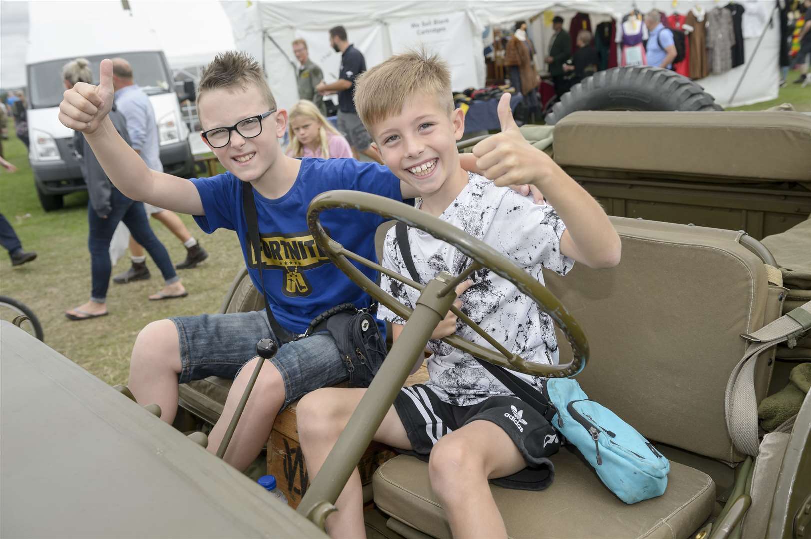 Ben, 9, and Callum, 9, ride a 1943 Jeep at last year's show
