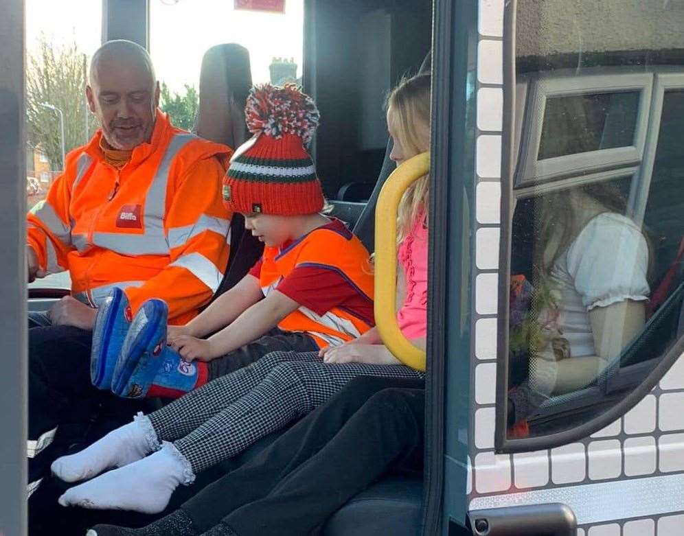 William and Lee Beresford in the electric Biffa truck (55038189)