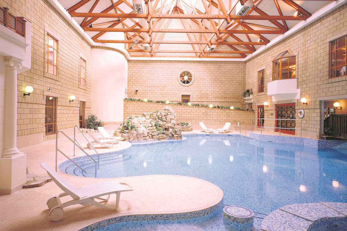 The swimming pool at Tudor Park Marriott Hotel and Country Club in Bearsted, Maidstone