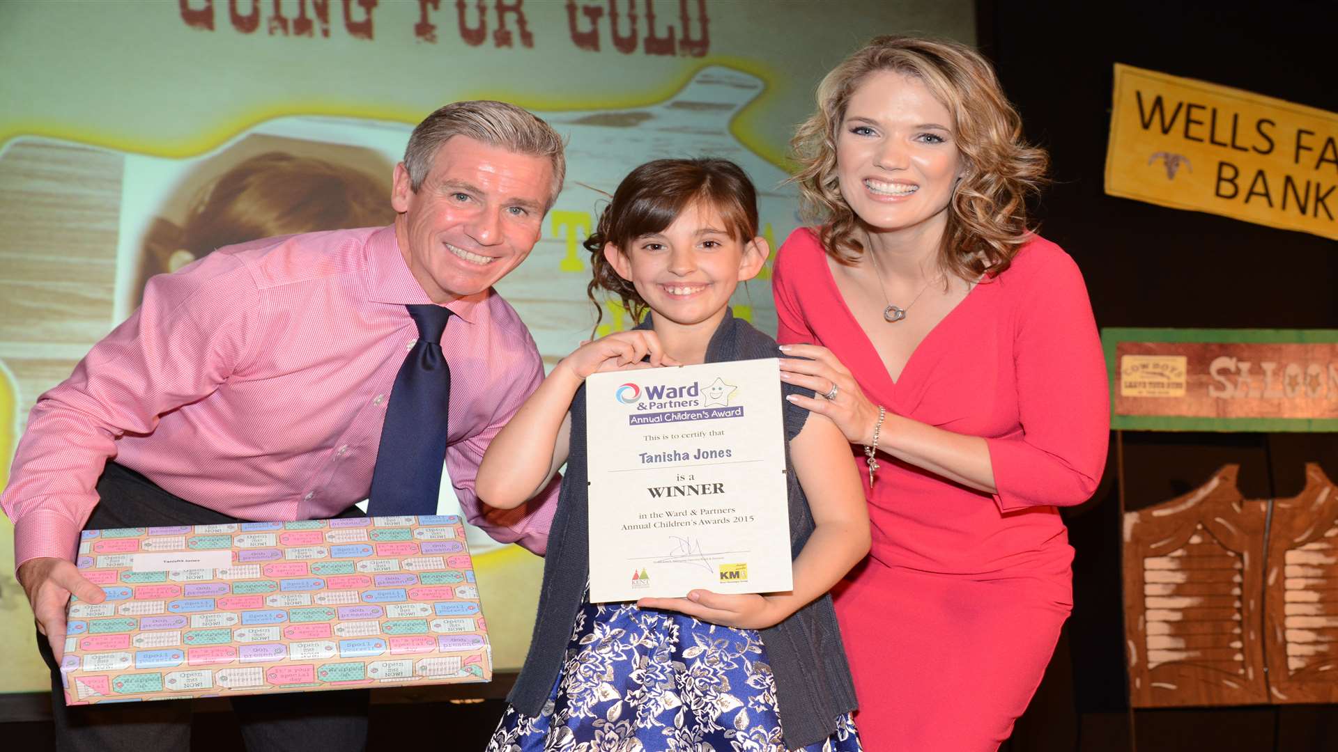 Charlotte Hawkins and Keith Lovell presenting an award to Tanisha Jones