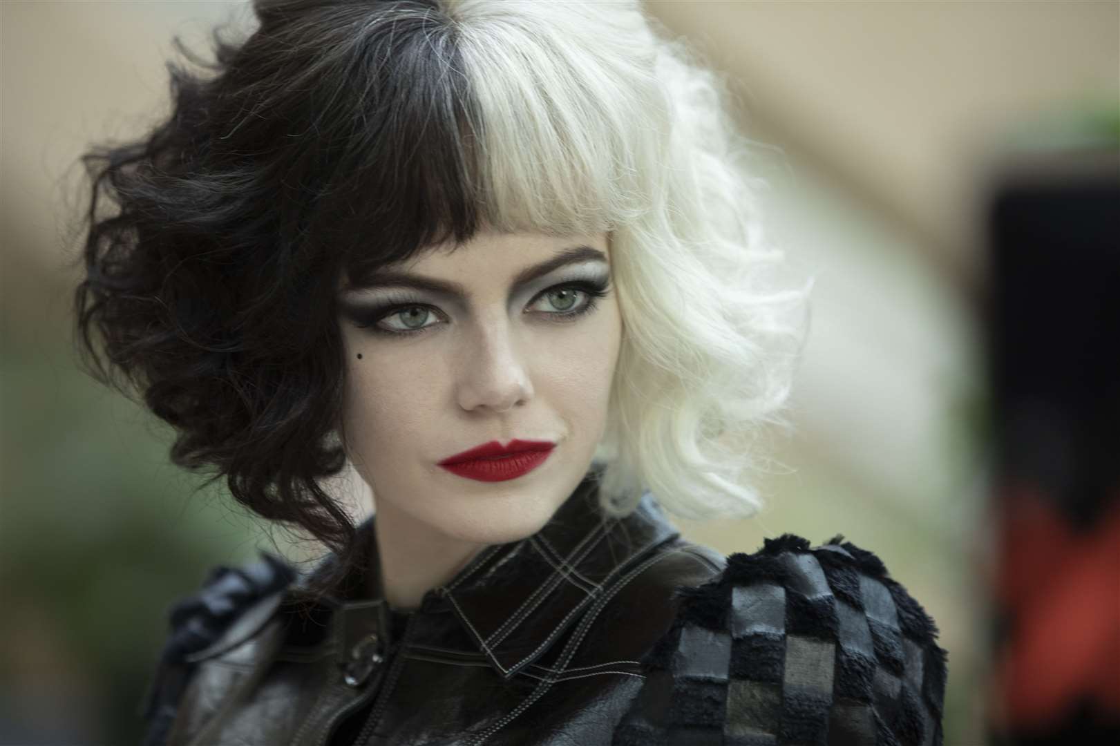 Emma Stone as Cruella