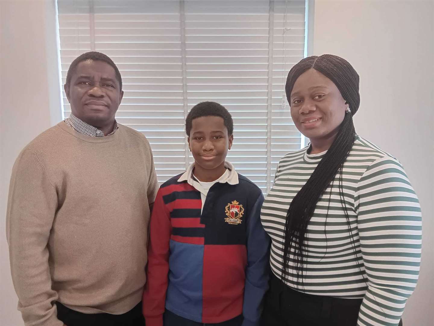 Brian with parents Mudiaga and Joy