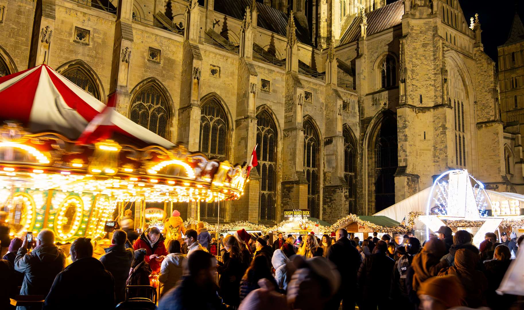 The festive market stalls will return to Canterbury Cathedral Precincts this month. Photo: Josh Carter