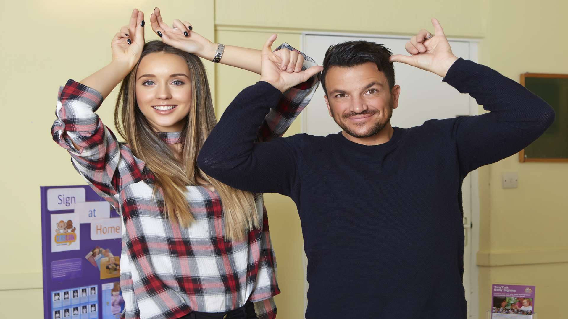 Peter Andre swaps singing for signing with help from wife Emily. Picture: npower