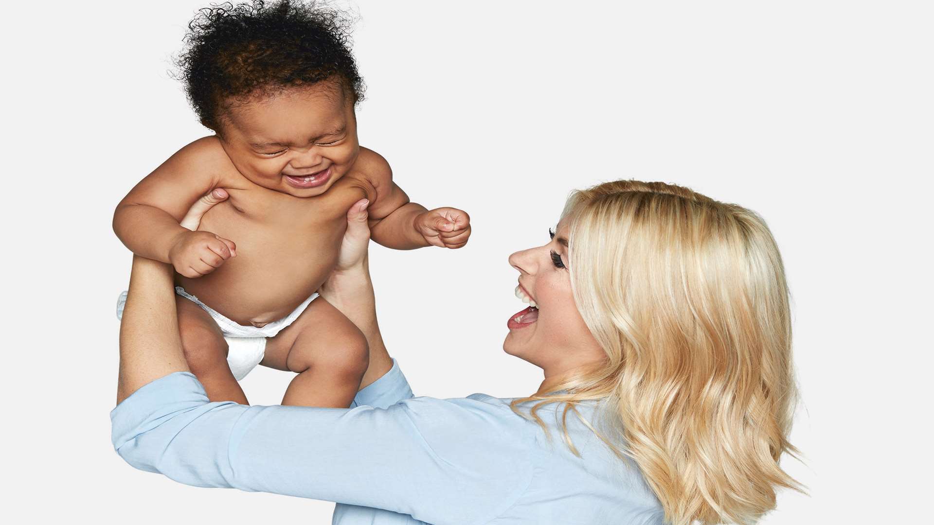 Holly Willoughby with a baby, taken from Truly Happy Baby: It Worked for Me