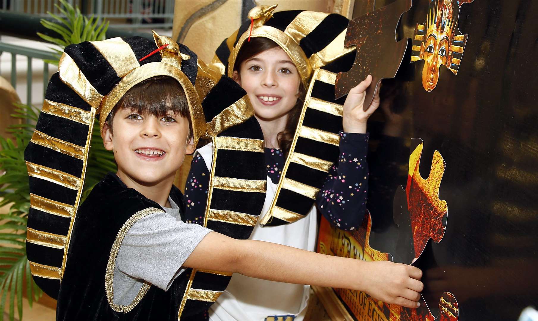 Royal Victoria Place, Tunbridge Wells, Walk Like an Egyptian summer exibition.Young Pharaohs for the day solving an Eqyptian puzzle Milly 8 and Frankie Amorese 7.Picture: Sean Aidan (3346281)
