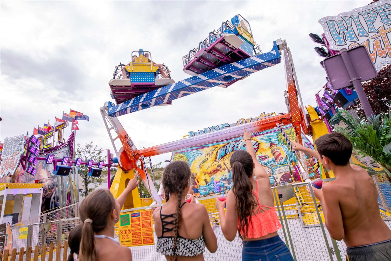 Guests will be required to wear face masks on two rides this year