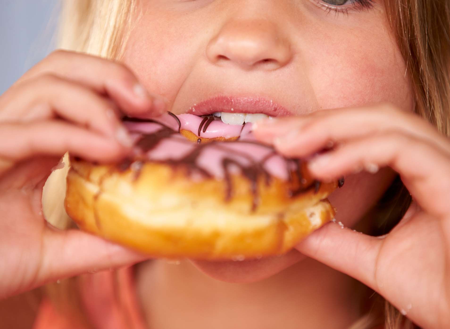 Families are being urged to ditch the doughnuts in favour of two healthy snacks a day.