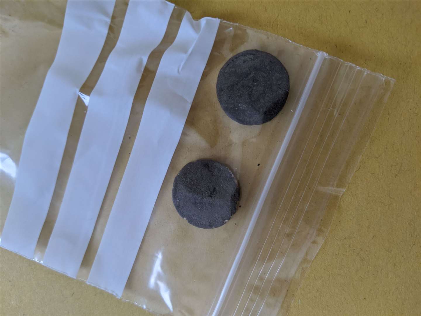The coins are now bagged for the experts to look at