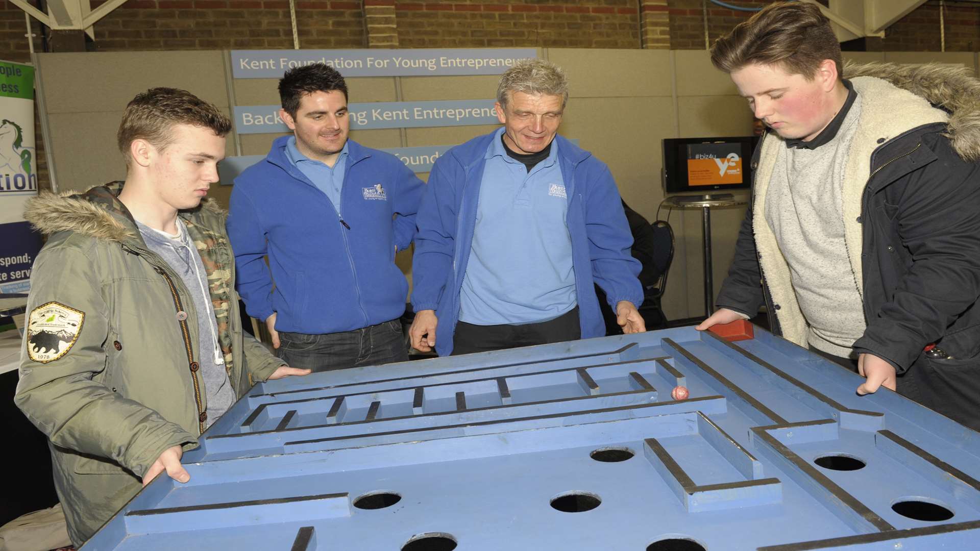 Tackling the Kent Foundation's team building maze at last year's event