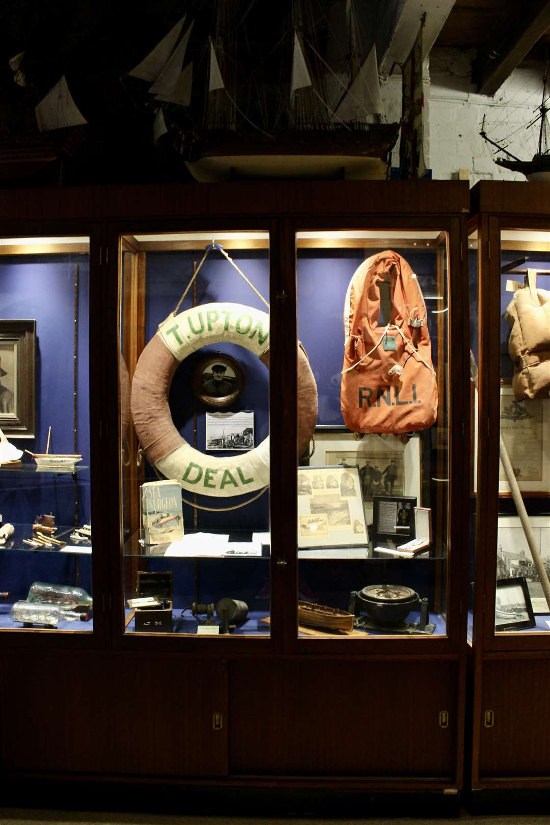 Exhibits in some of the cabinets at Deal Maritime & Local History Museum (49849364)