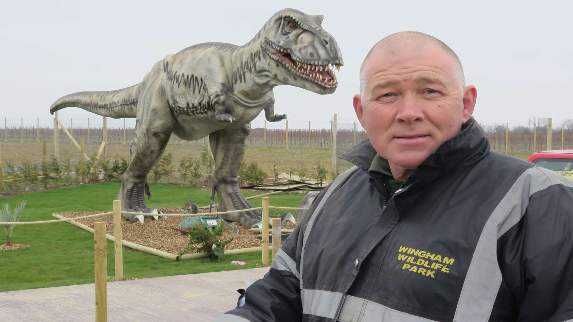 Wingham Wildlife Park owner Tony Binskin with the mighty T-Rex.