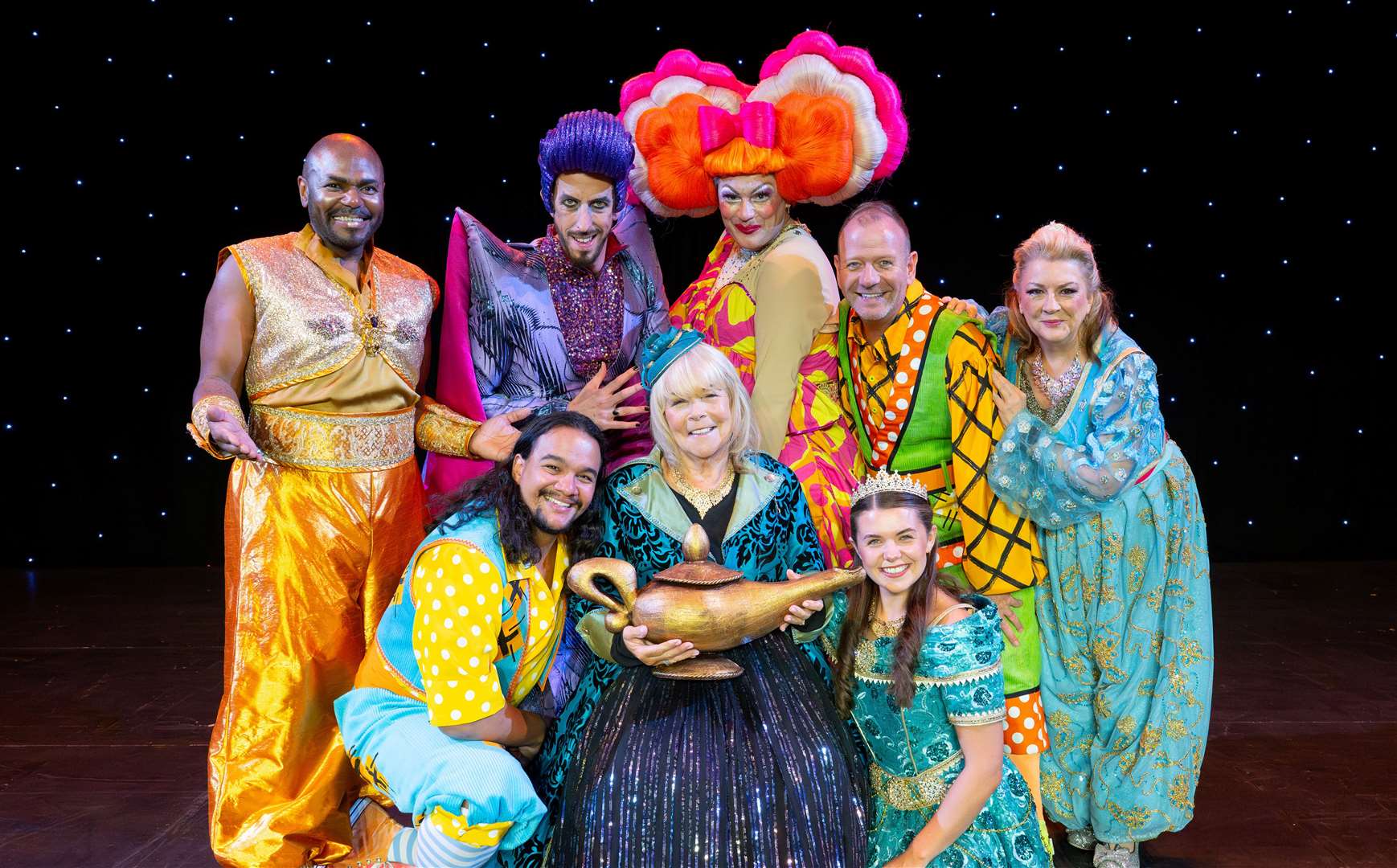 Linda Robson, pictured with the Aladdin cast, is known for starring in ‘90s sitcom Birds of a Feather alongside Pauline Quirke and Lesley Joseph. Picture: Elliott Franks