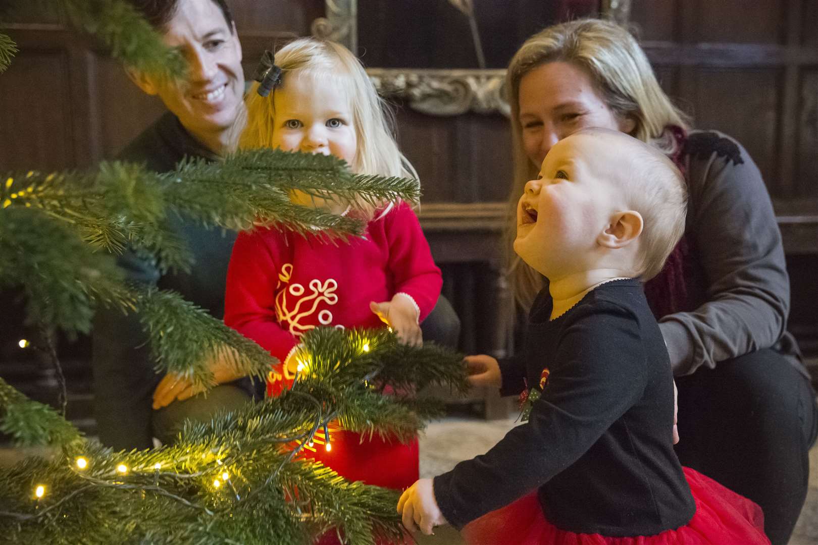 Visitors admiring the festive Christmas decorations at Knole, Kent