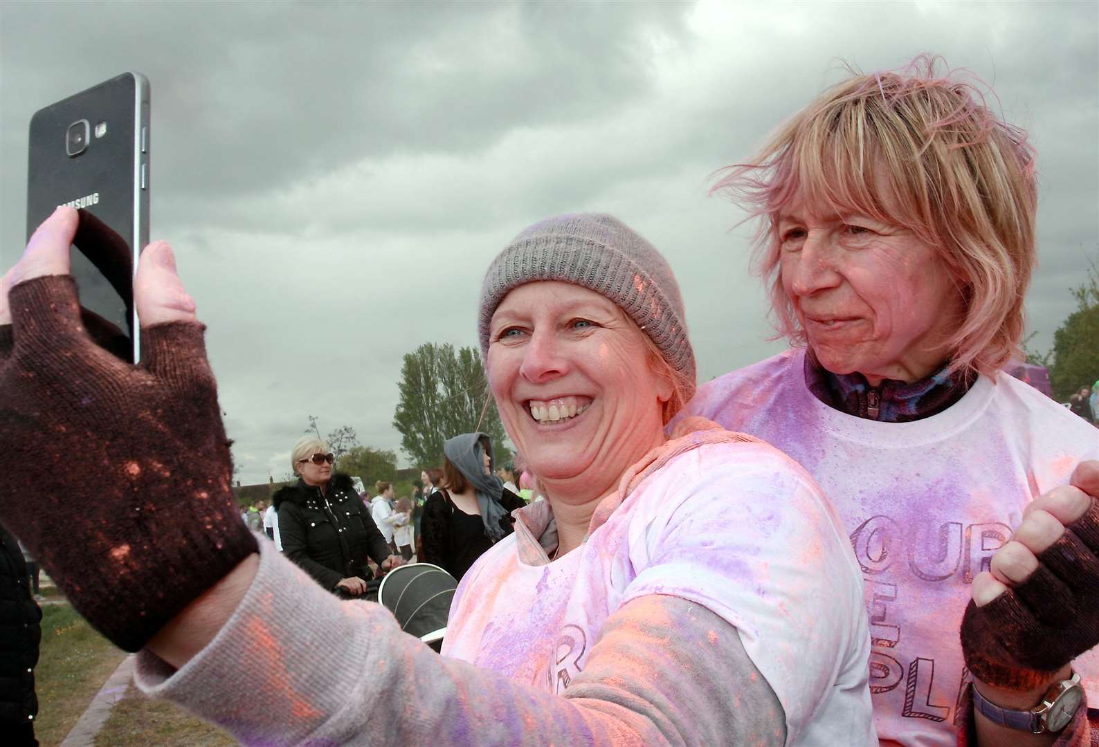 Sara Wickford (left) and Gill Whitehead take a selfie before the 2019 Colour Me Purple run at Sittingbourne. Picture: Phil Lee