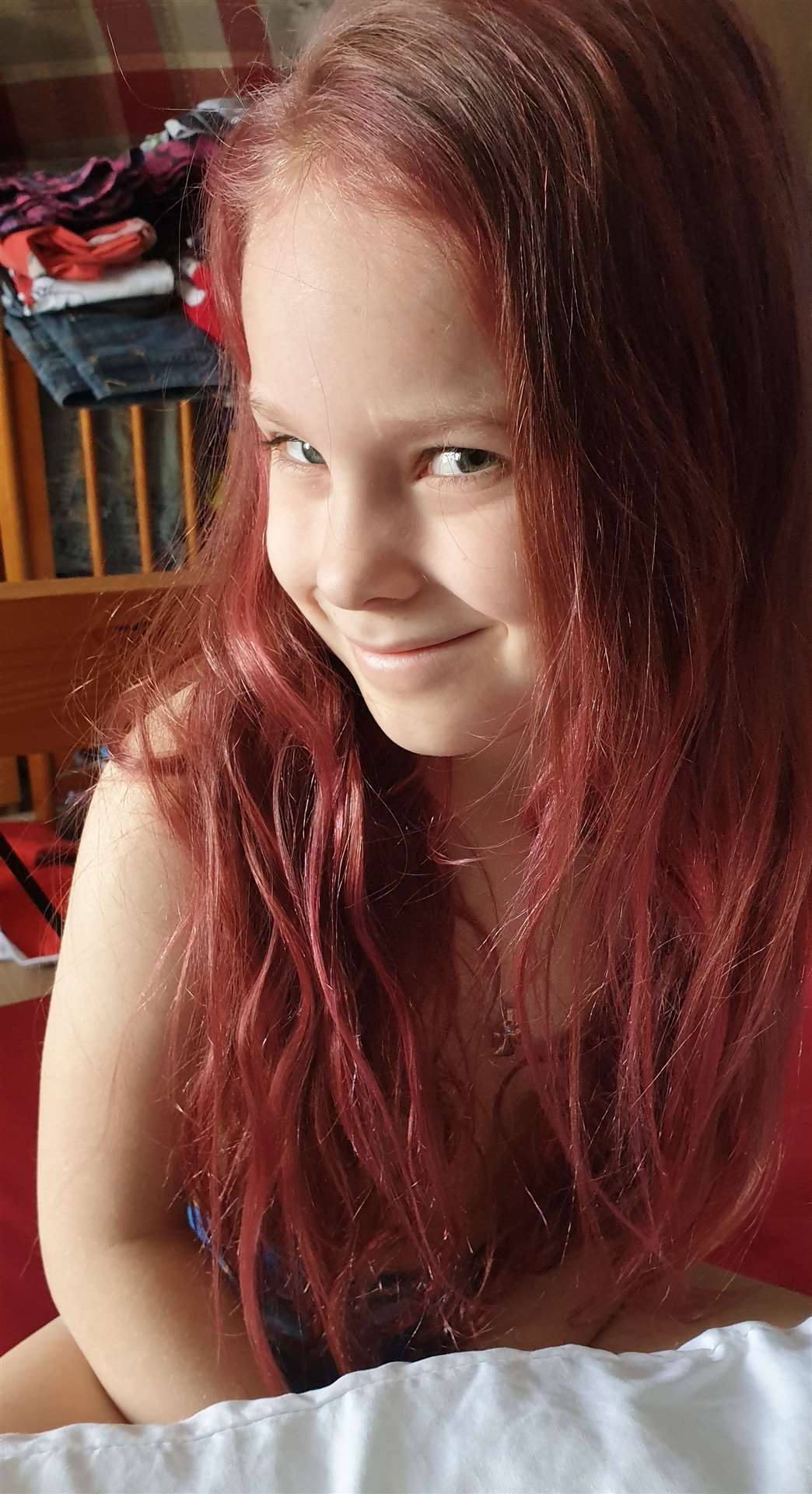 Louise Williams took this picture of nine-year-old Bella trying pink hair in lockdown for Snapshot Kent