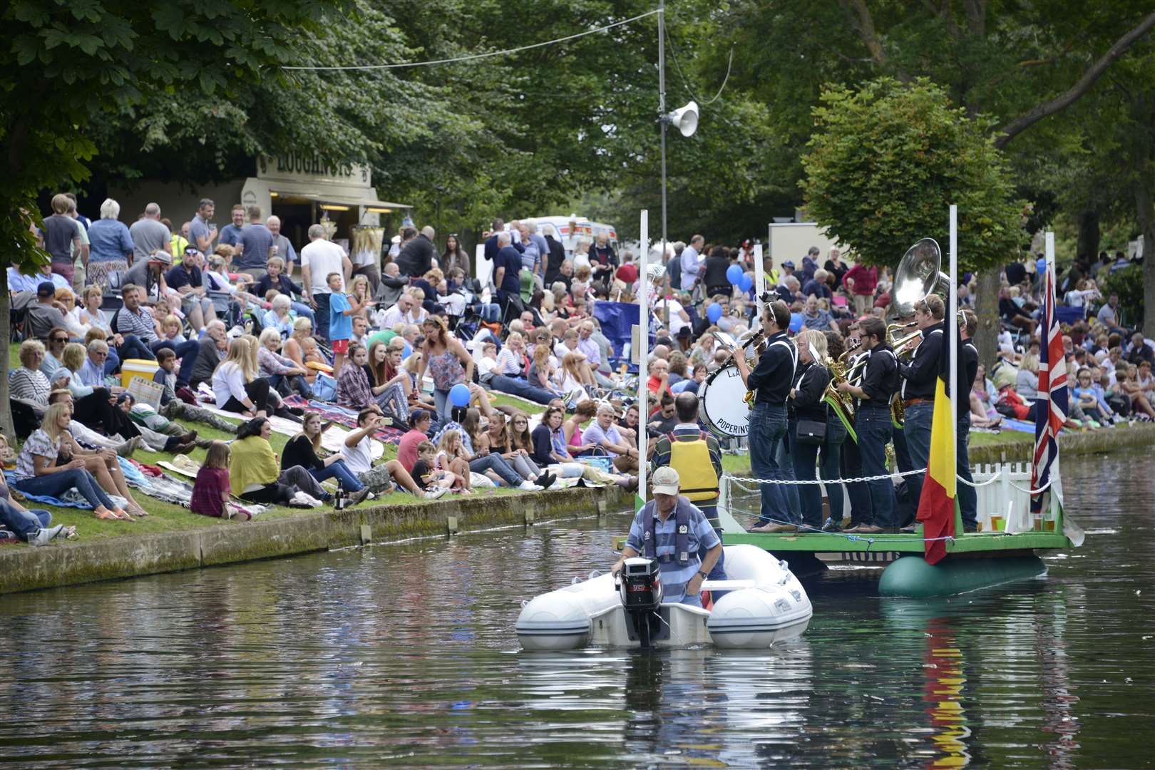 Visitors flock to the banks of the canal to enjoy the fete
