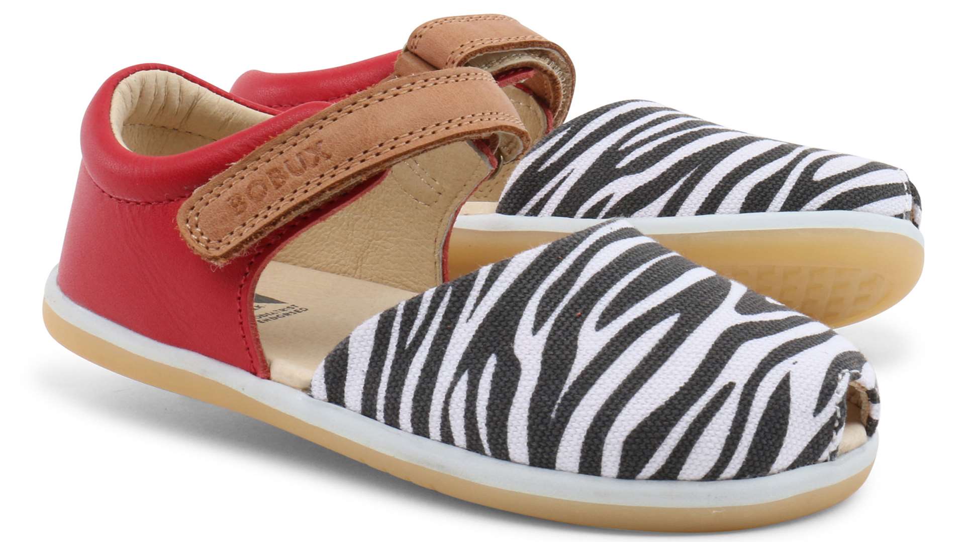 Step out in style with these Bobux Twist sandals in Red With Zebra, available in sizes 22-26, from £45 (www.bobux.co.uk)