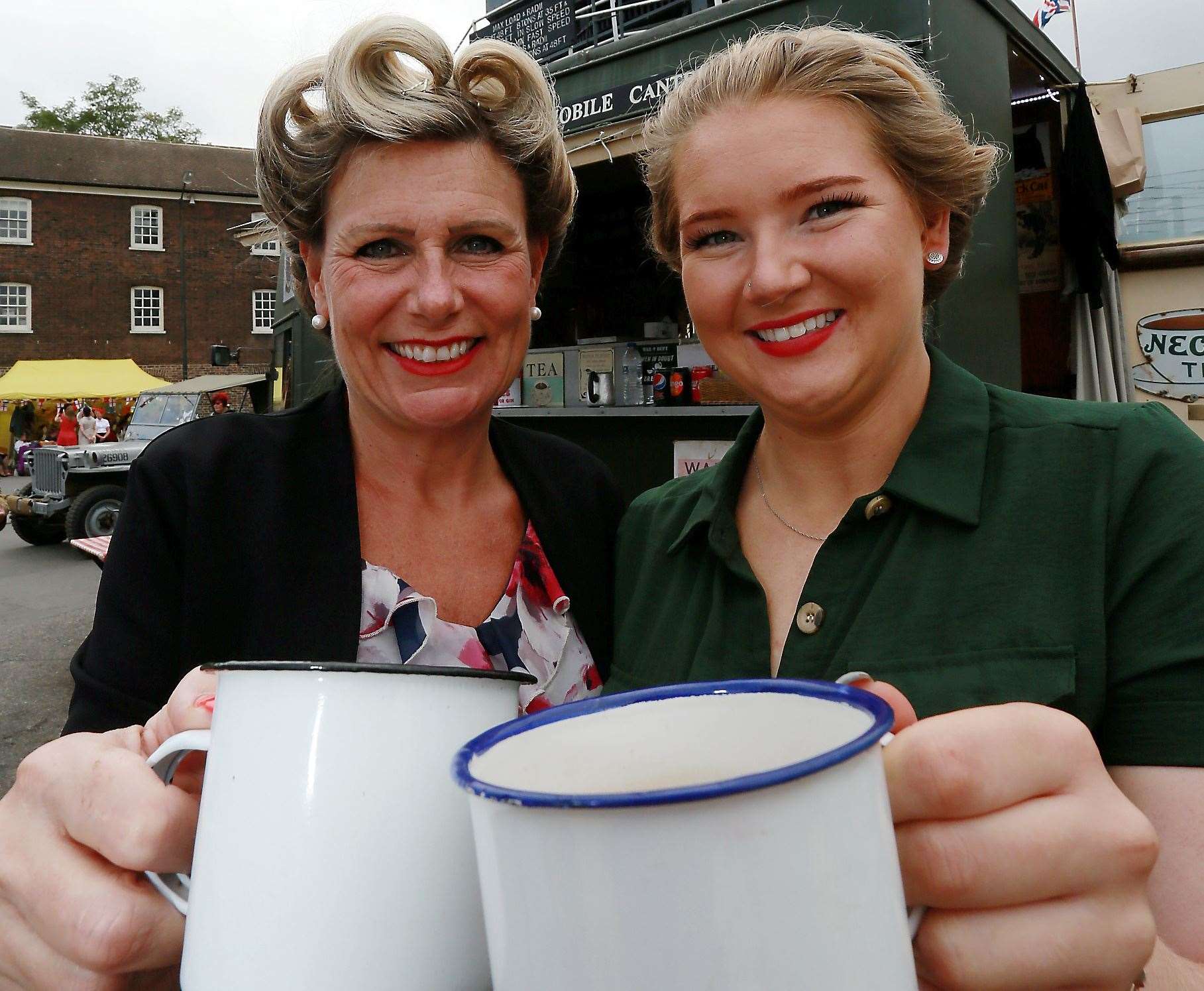 Keep calm and celebrate VE Day 75 40s style - Pictured Joanne Butler (left) and Jayme Goodger at last year's Salute to the 40s at the Historic Dockyard Chatham. The event is currently scheduled for September, government restrictions permitting Picture: Phil Lee