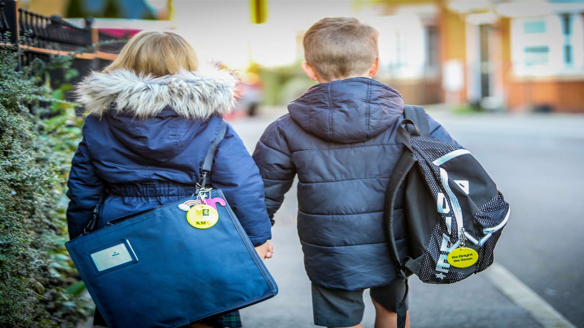 If your children wear dark coats or clothing, use reflective disks or strips to ensure they can be picked up by cars