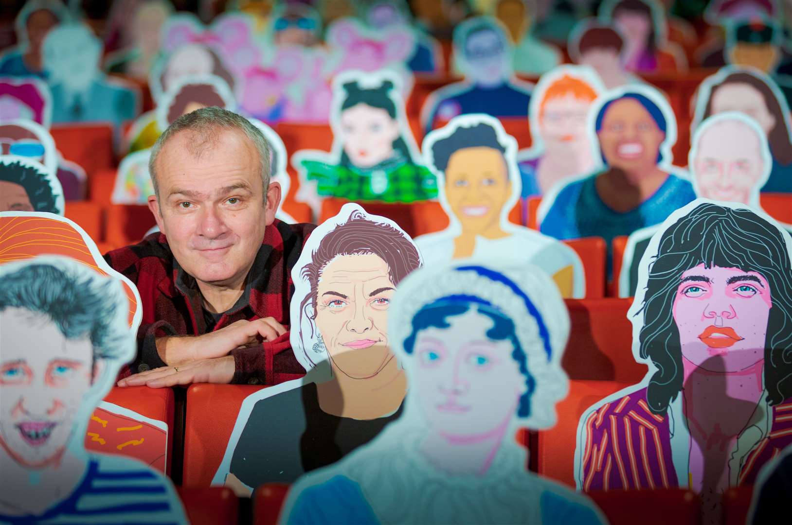 Portrait artist Ben Dickson with cut-outs in the Marlowe's auditorium. Picture: Richard Lea-Hair/The Marlowe