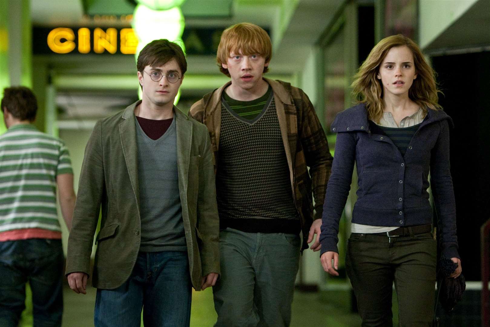 Daniel Radcliffe as Harry Potter, alongside Rupert Grint as Ron and Emma Watson as Hermione. Photo by Jaap Buitendijk courtesy of Warner Bros Entertainment.