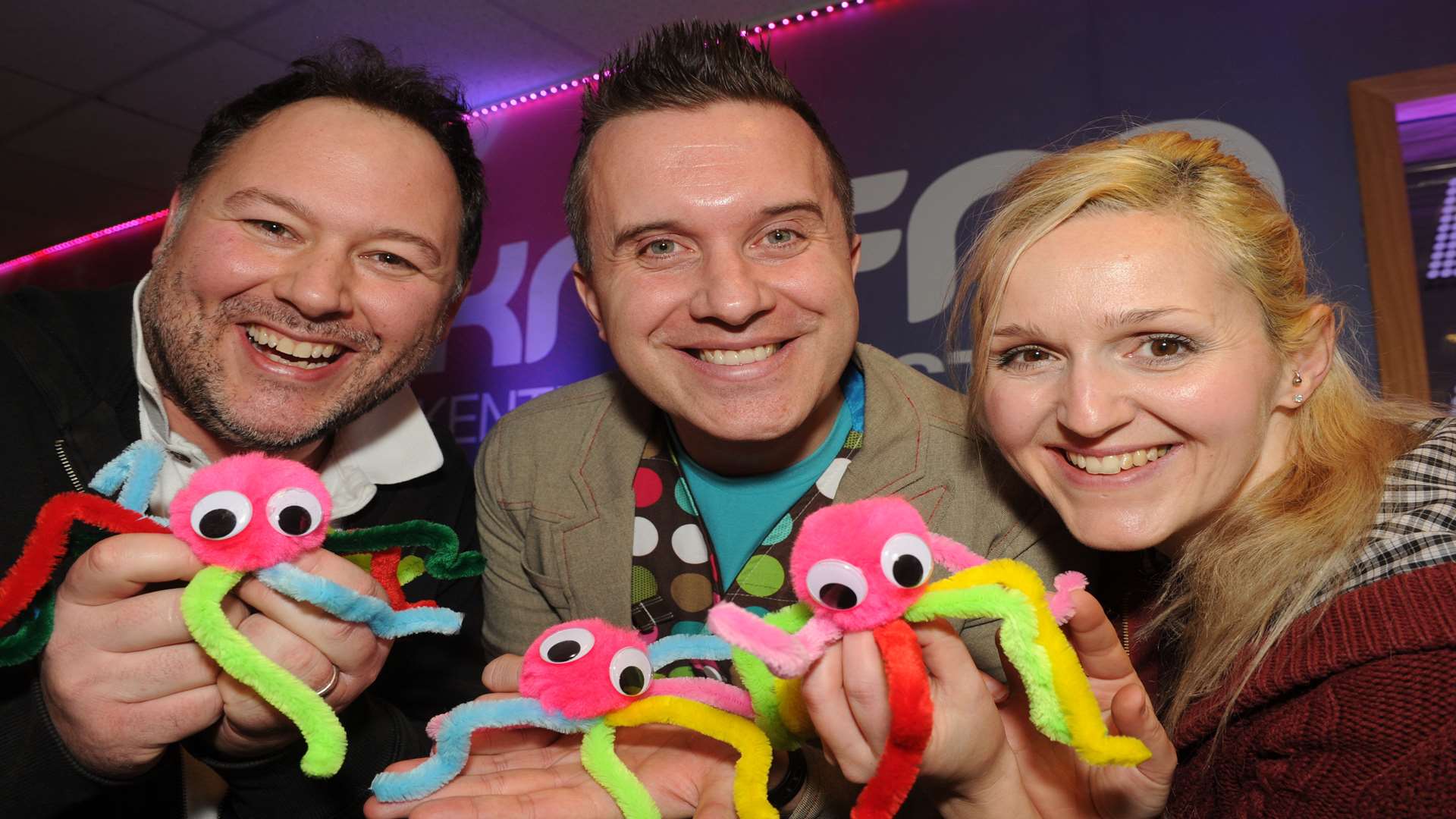 Cbeebies star Mister Maker, aka Phil Gallagher, makes Pom Pom bugs with Garry and Emma from kmfm breakfast on a previous visit to the station.