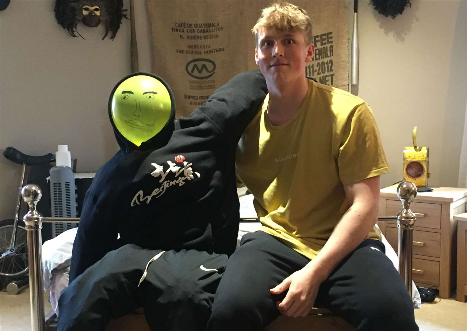 Kent Online reporter Rebecca Tuffin took this picture of her brother, George Tuffin, 17, of Maidstone Grammar School with his newspaper-stuffed, balloon-headed pal, Trevor Baloo.
