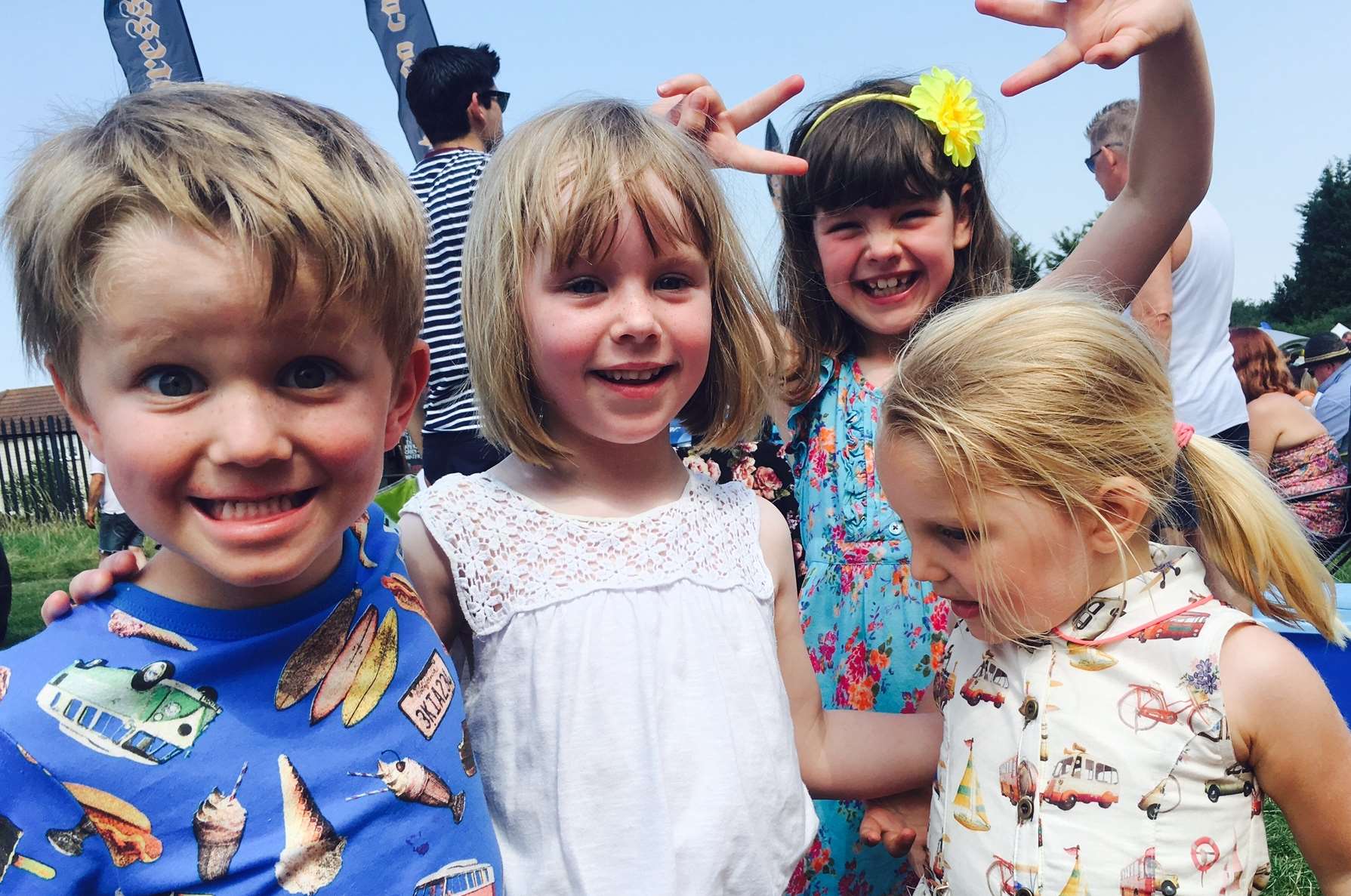 Festivals are more fun with friends - even if you can't ever get four little people to all look in the same direction!