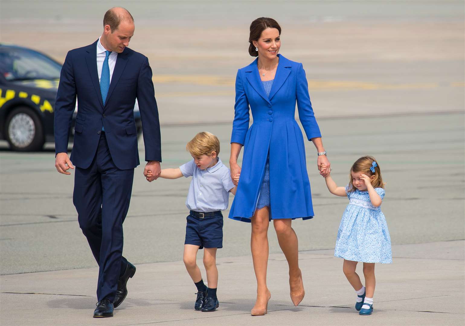 The Duke and Duchess of Cambridge, Prince George and Princess Charlotte at the airport ahead of a royal tour