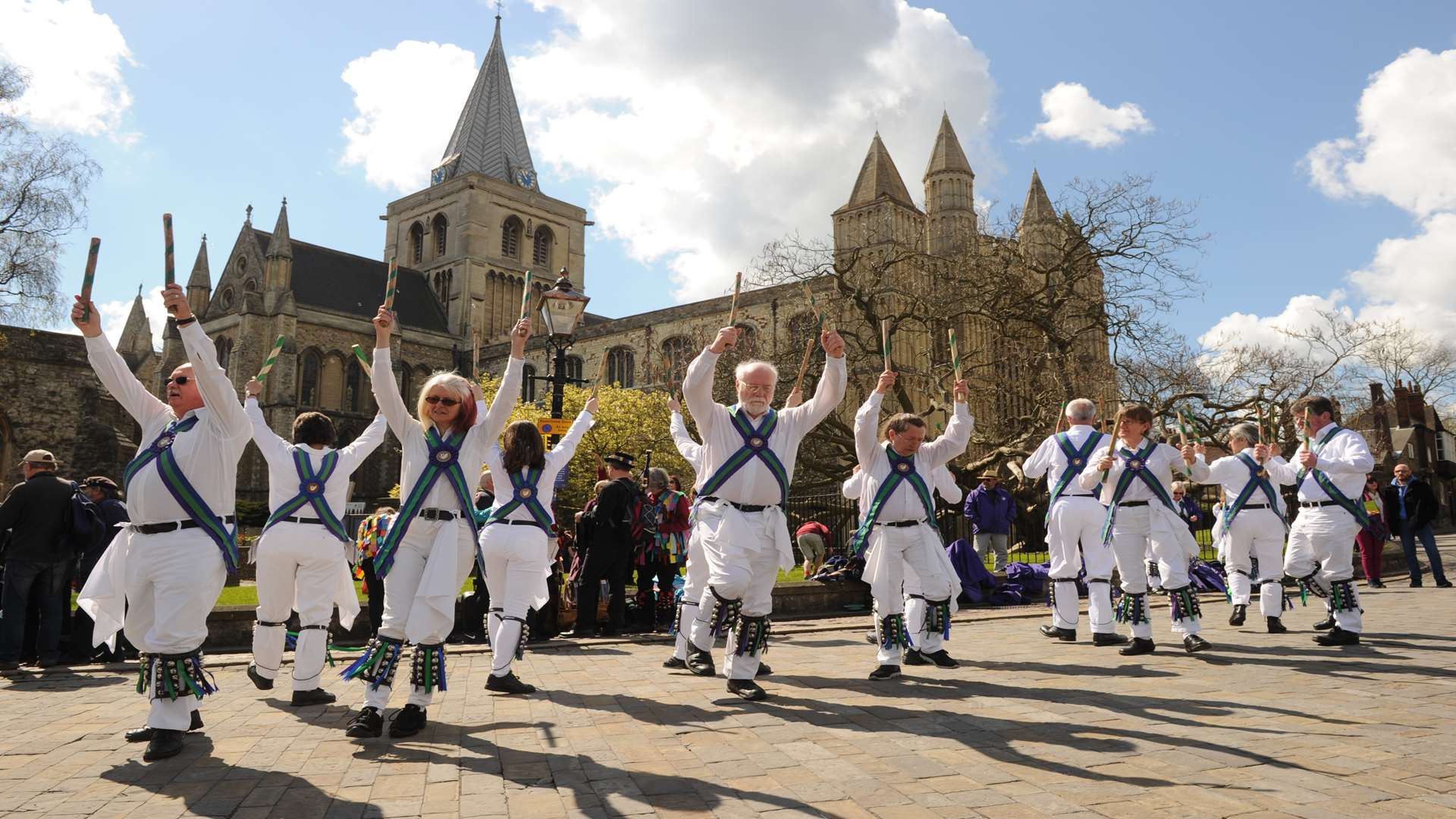 Morris dancers outside Rochester Cathedral at the Sweeps Festival