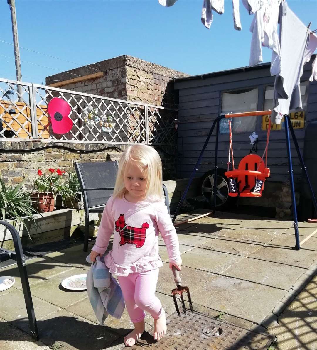 Joe from Sheerness sent this picture in of daughter Robyn in the back garden for Snapshot Kent