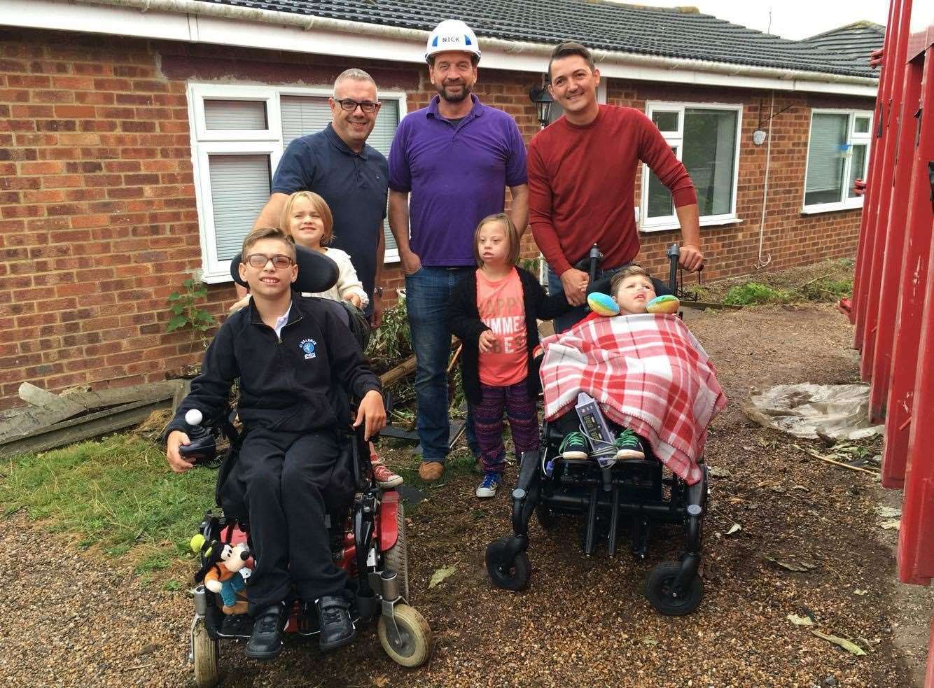 The Ratcliffe family with DIY SOS presenter Nick Knowles