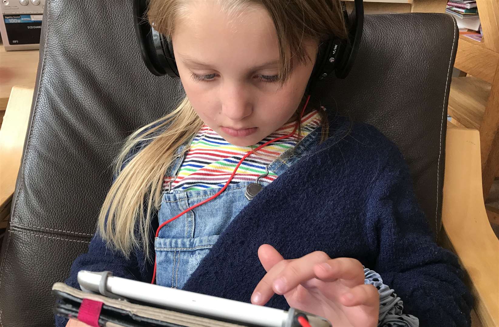 Liv, 6, has definitely spent more time than normal glued to a tablet