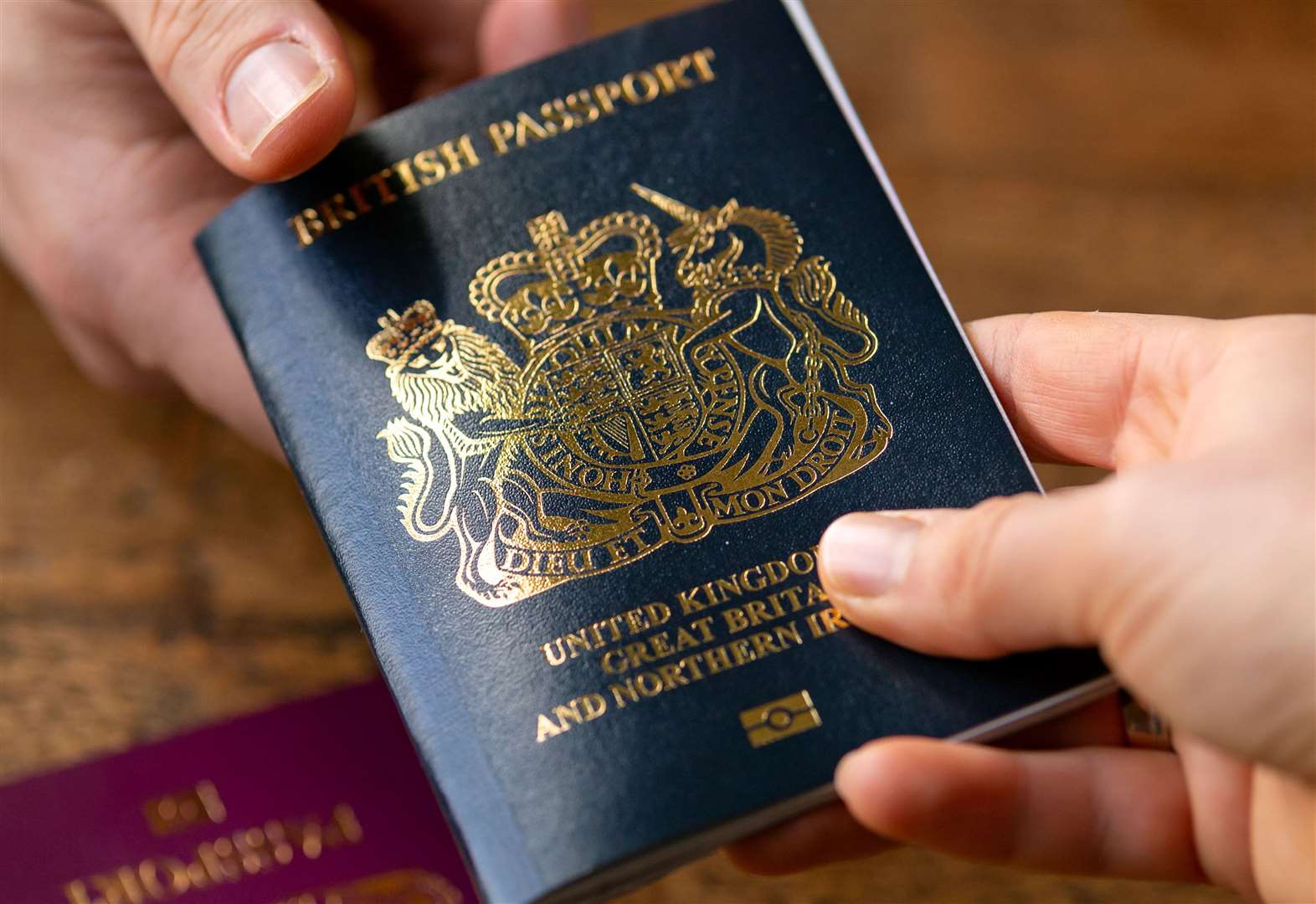 What does it cost for a new British passport after February 2, 2023