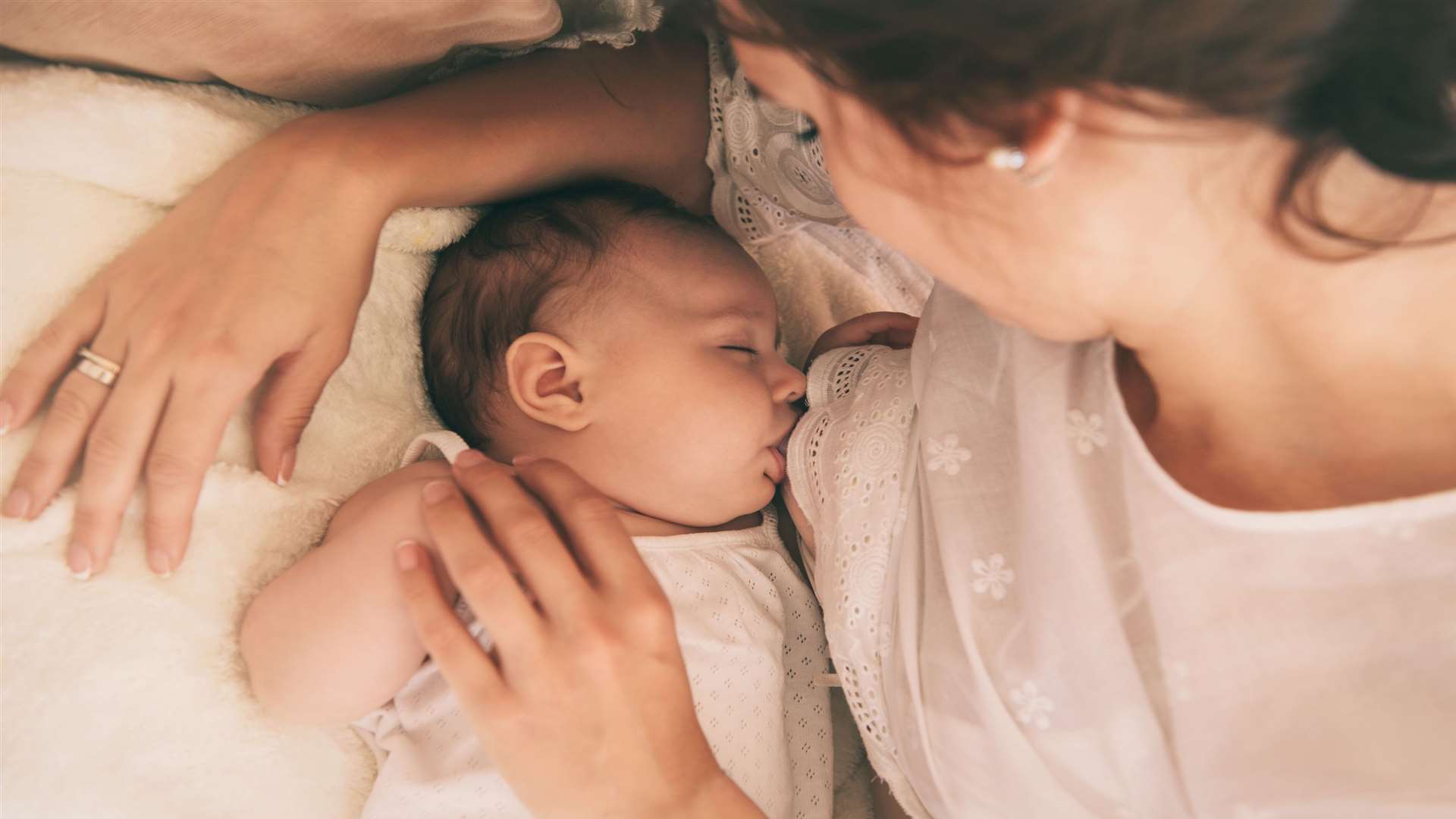 'Breastfeeding, while natural, is something all mums and their babies learn by doing'