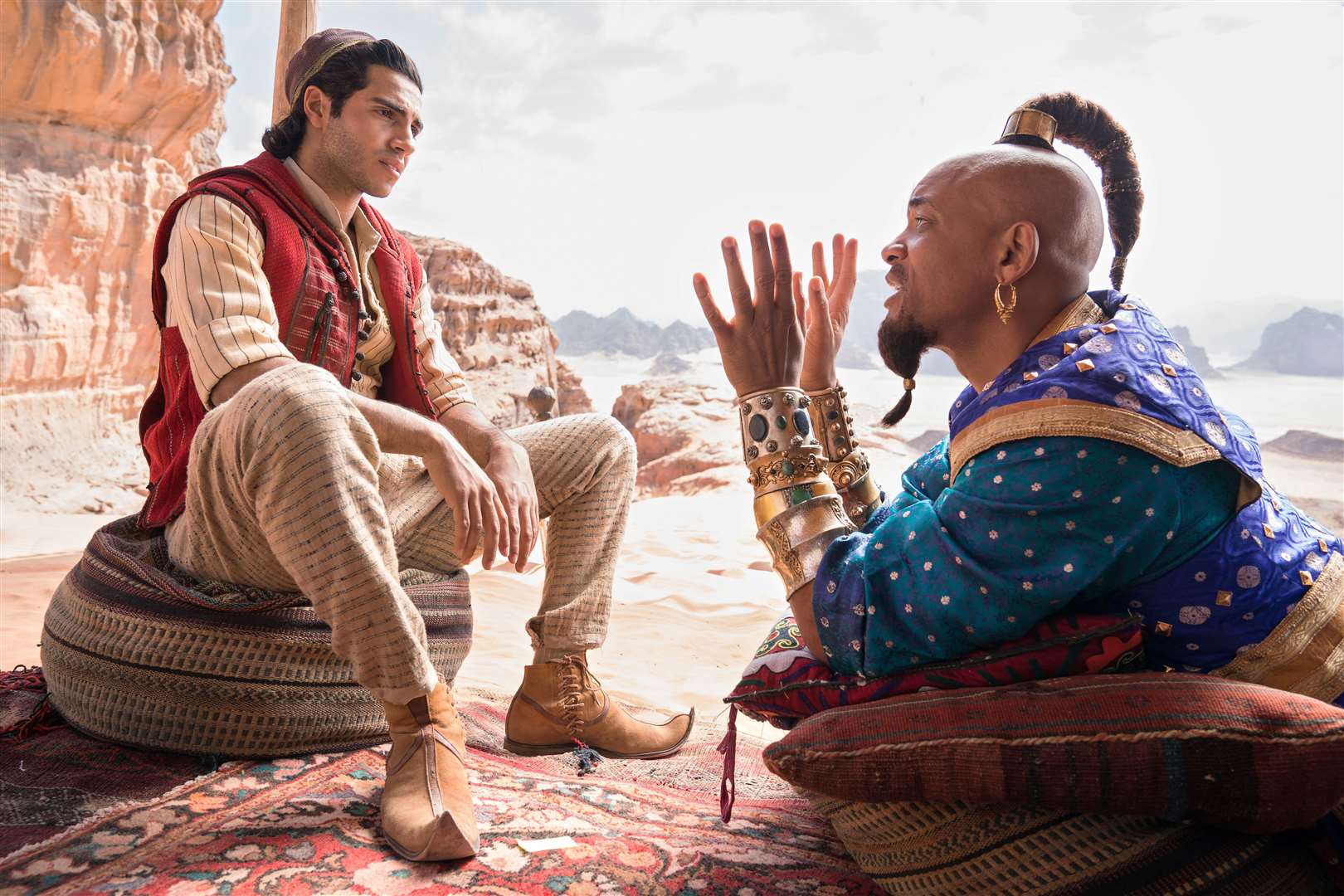 Mena Massoud as the street rat with a heart of gold, Aladdin, and Will Smith as the larger-than-life Genie in Disney’s ALADDIN, directed by Guy Ritchie