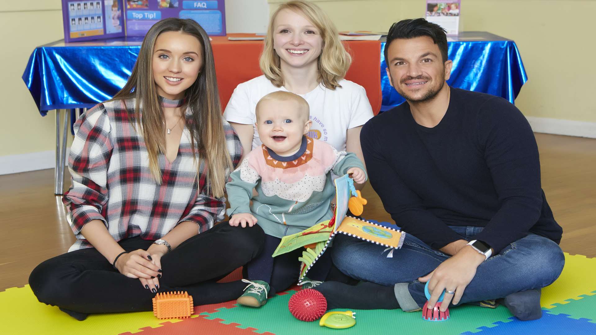 Rebecca Oakley taught Peter and Emily Andre about the sign language she uses with her own baby. Picture: npower