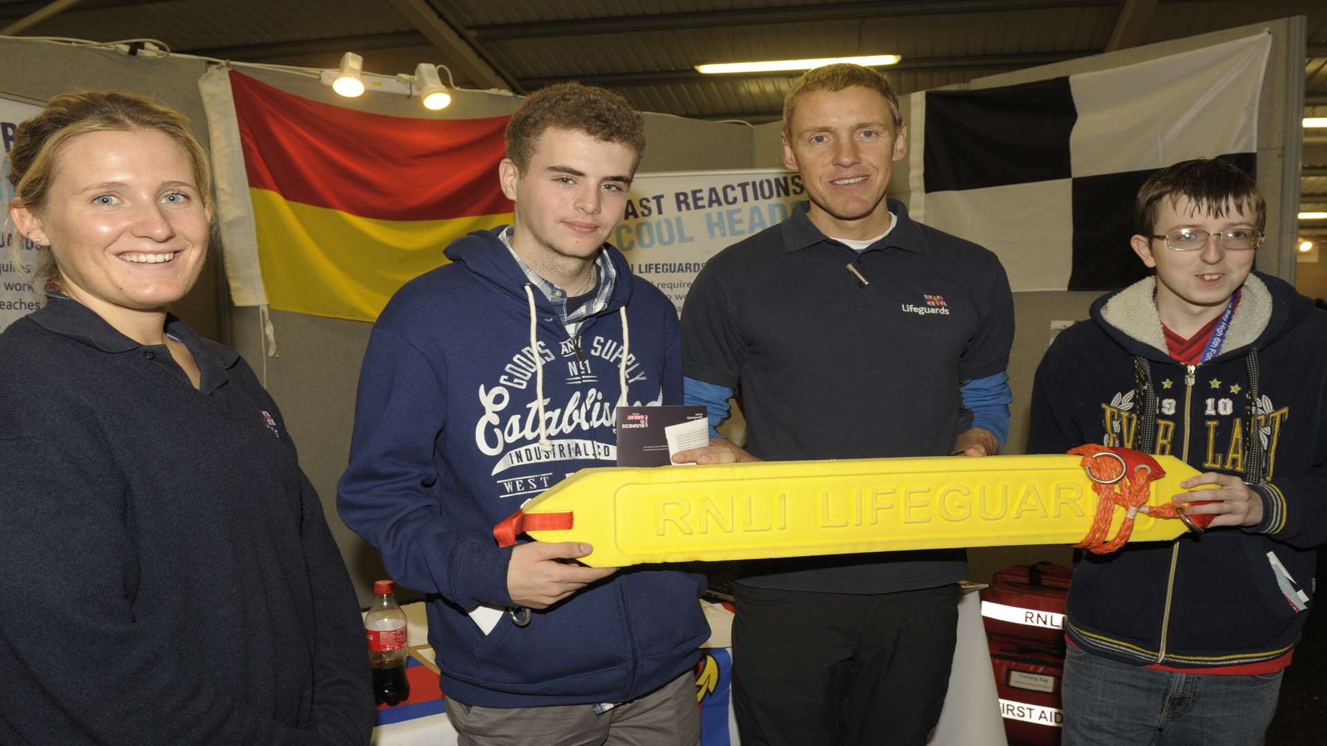 Pupils from Herne Bay with Becky Fox and Tomas Thorndycraft at the RNLI stand