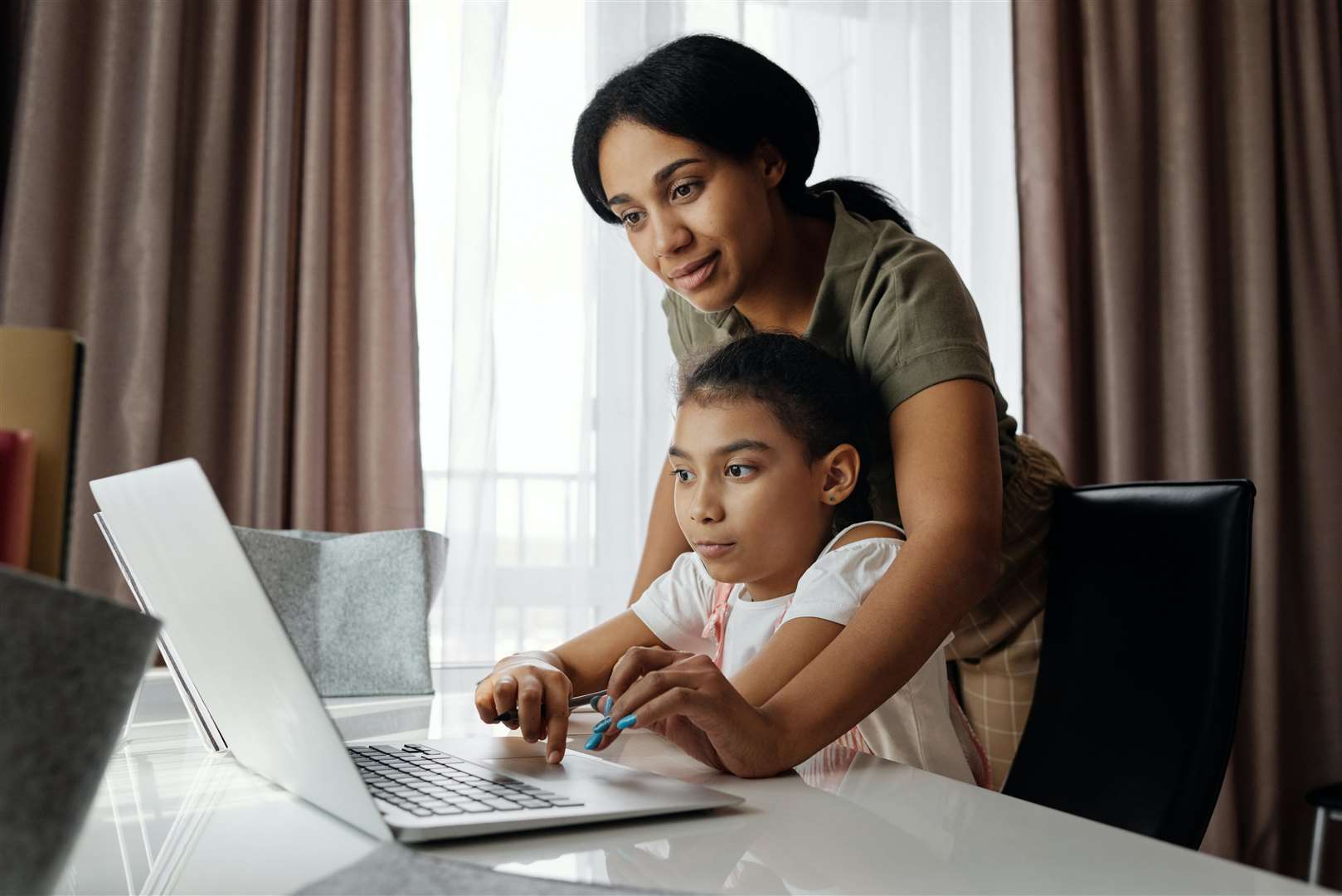 A Tutor Boss pupil and their parent. Stock Image