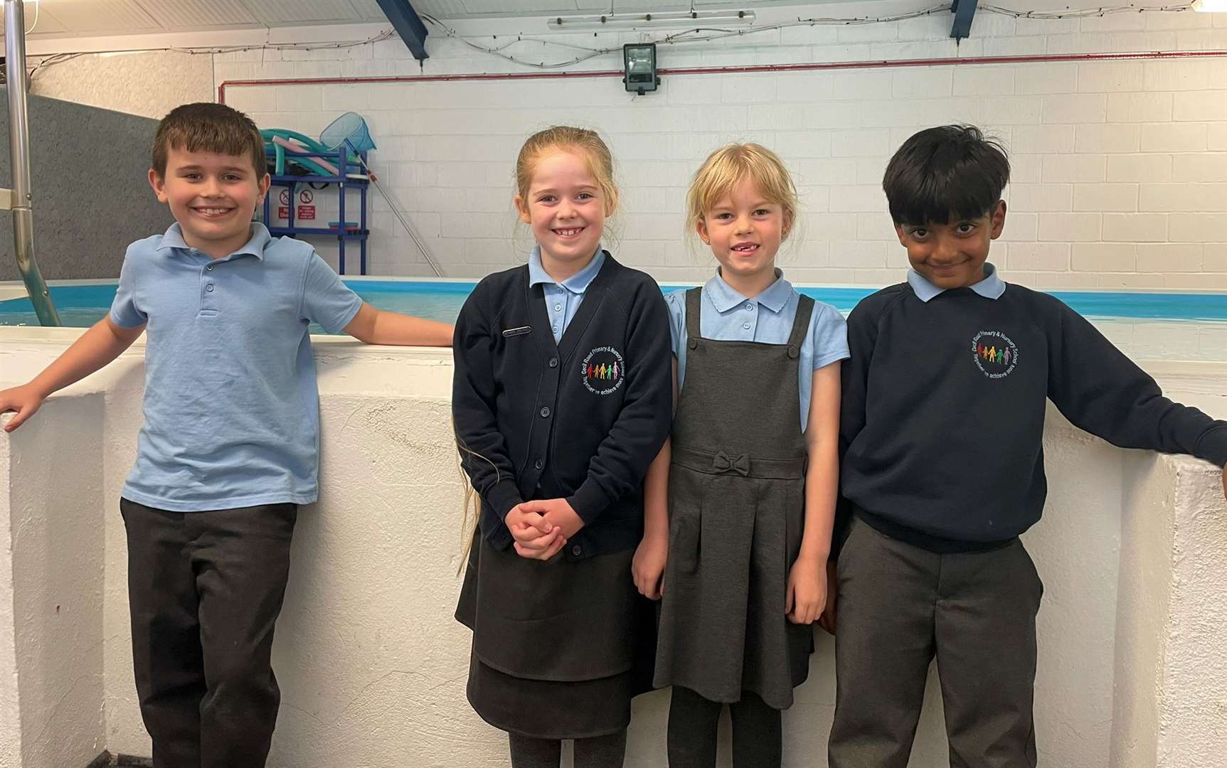 Year 3 pupils Harvey, Cleo, Wren and Aedon love the swimming pool