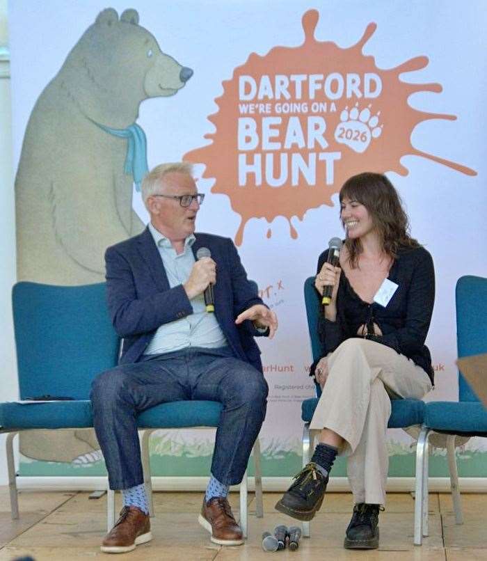 Former BBC South East Today presenter Rob Smith speaks with artist Ana Zoob about the inspiration behind her vibrant bear sculpture during the launch event at Dartford Football Club
