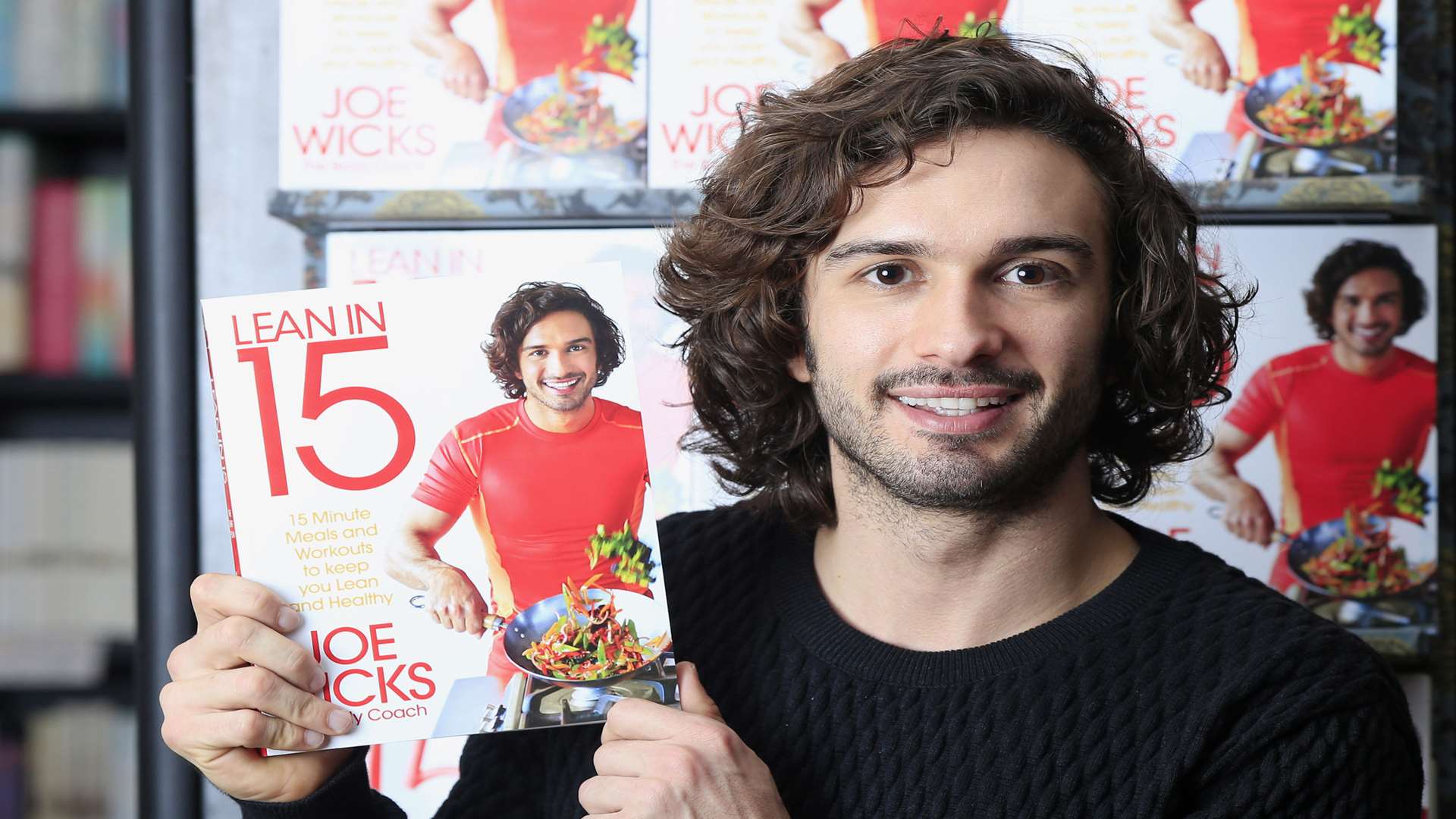 Fitness guru Joe Wicks with his book Lean in 15