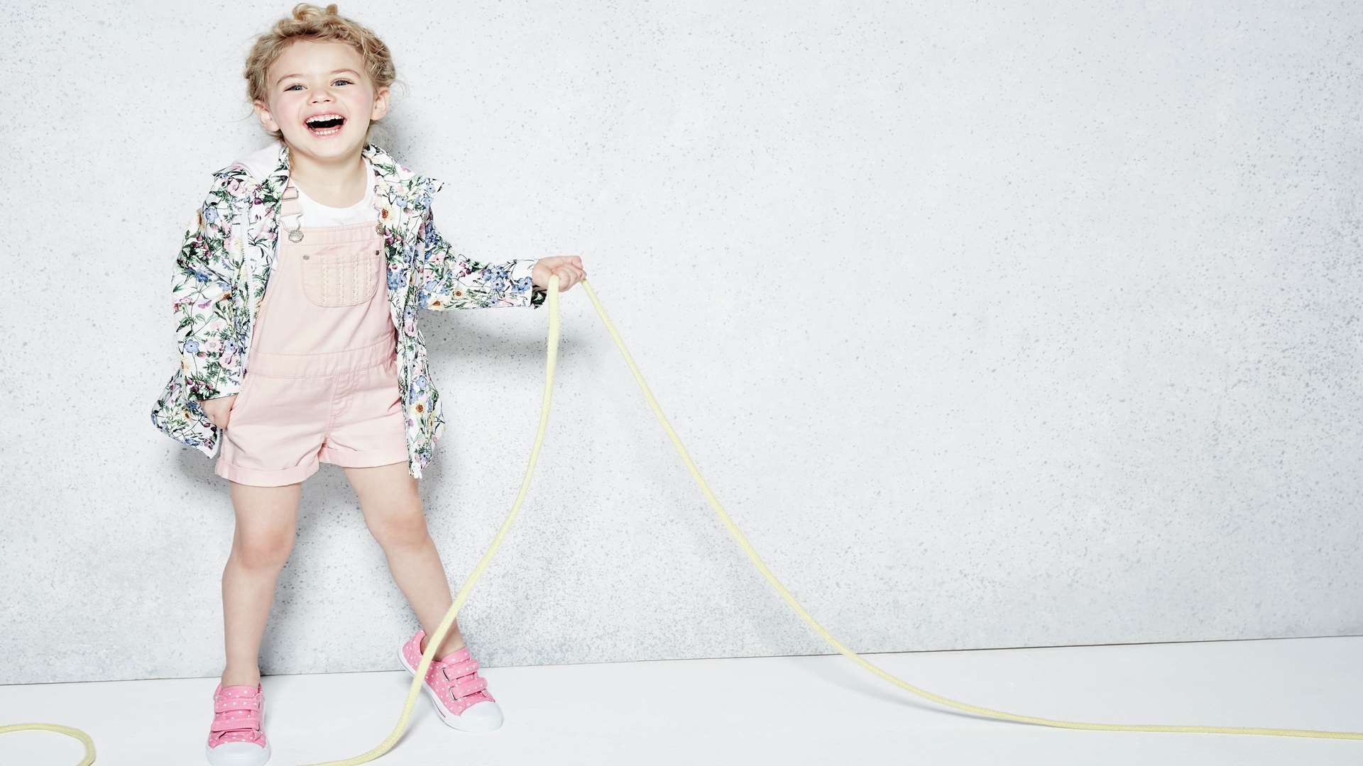 Printed mac from £11, pink dungaree set from £12 and canvas £6. all from F&F at Tesco.