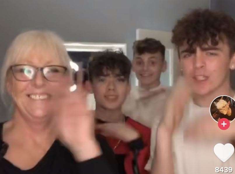 Janice Hills and her grandson Ronnie perform a dance for her TikTok channel with Connor Robinson and Louie Mills