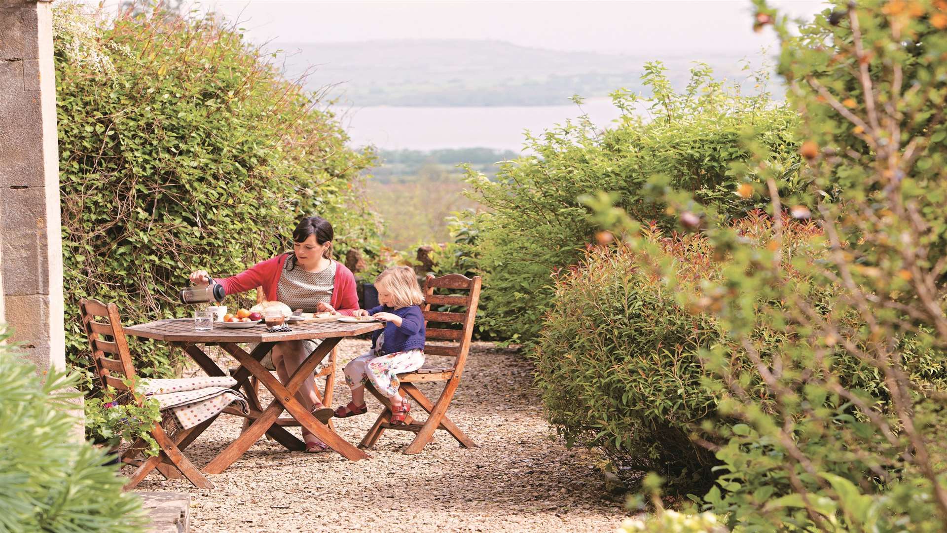 Claire eating lunch in her garden